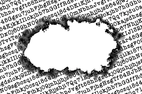 A sheet of encoded letters being burned